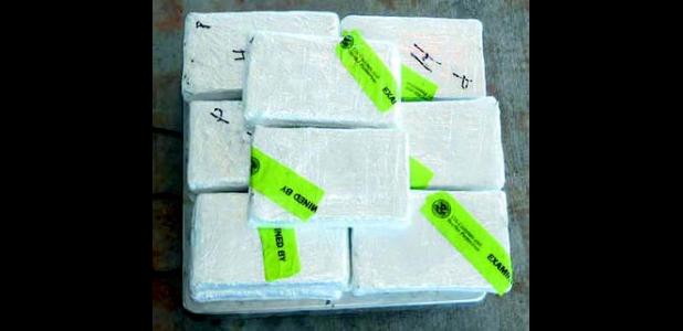 Bundles containing 33 pounds of cocaine seized by CBP officers at Pharr International Bridge.